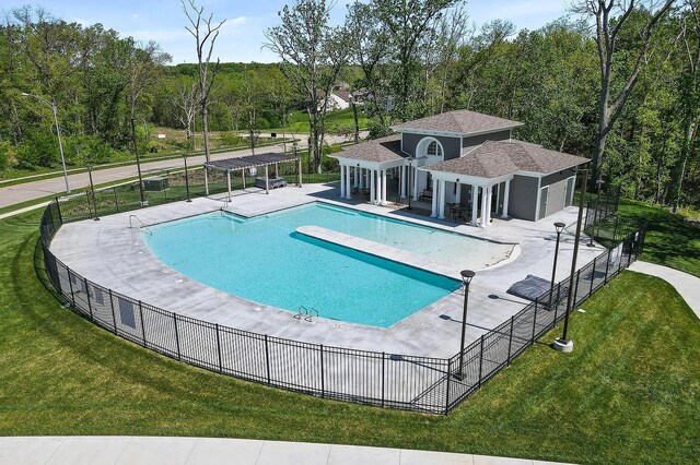 709 Sagemoor Dr, Columbia, MO 65201 - pool with a pergola, a yard, a patio area, and fence