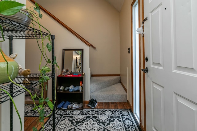 3701 Churchill Dr, Columbia, MO 65201 - entryway with baseboards, wood finished floors, and vaulted ceiling