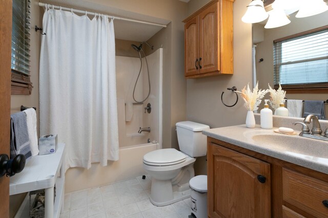 3701 Churchill Dr, Columbia, MO 65201 - full bath with shower / tub combo with curtain, toilet, and vanity