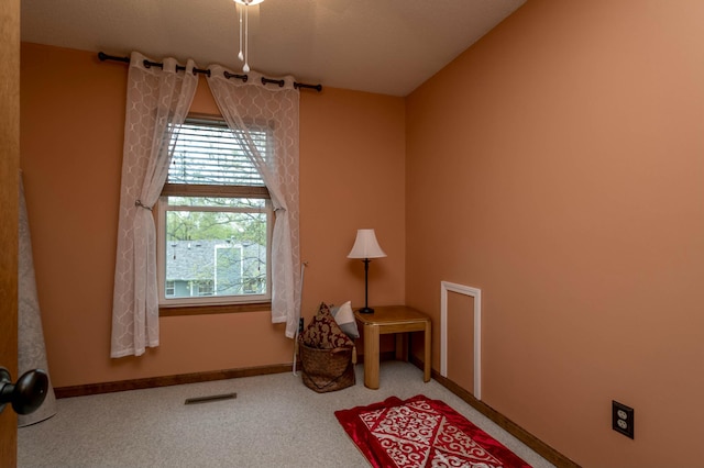 3701 Churchill Dr, Columbia, MO 65201 - living area with visible vents, baseboards, and carpet floors
