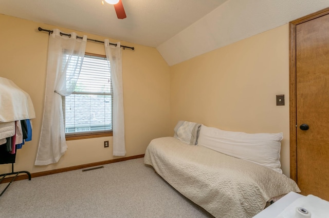 3701 Churchill Dr, Columbia, MO 65201 - carpeted bedroom featuring baseboards, visible vents, ceiling fan, and vaulted ceiling