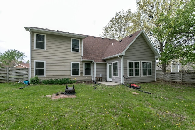 3701 Churchill Dr, Columbia, MO 65201 - back of house with a yard and a fenced backyard