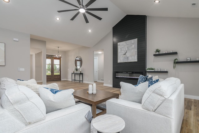6301 Crooked Switch Ct, Columbia, MO 65201 - living area featuring wood finished floors, ceiling fan, baseboards, a chandelier, and recessed lighting