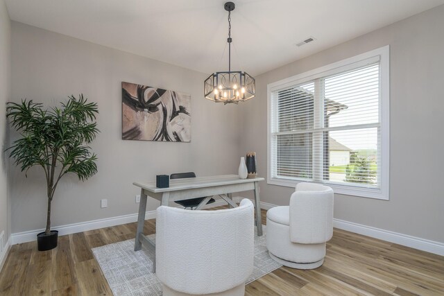 6301 Crooked Switch Ct, Columbia, MO 65201 - dining room featuring wood finished floors, a chandelier, baseboards, and a desk