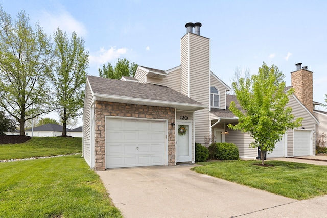 view of front of house with a shingled roof, stone siding, a front yard, a chimney, and driveway