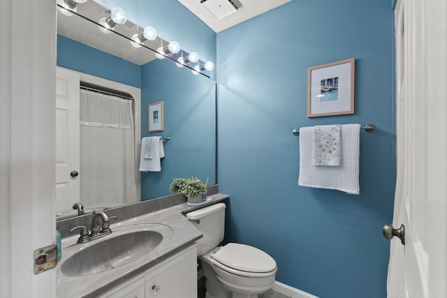 full bathroom featuring toilet and vanity
