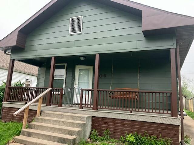 906 Myra St, Moberly, MO 65270 - view of front of property featuring a porch