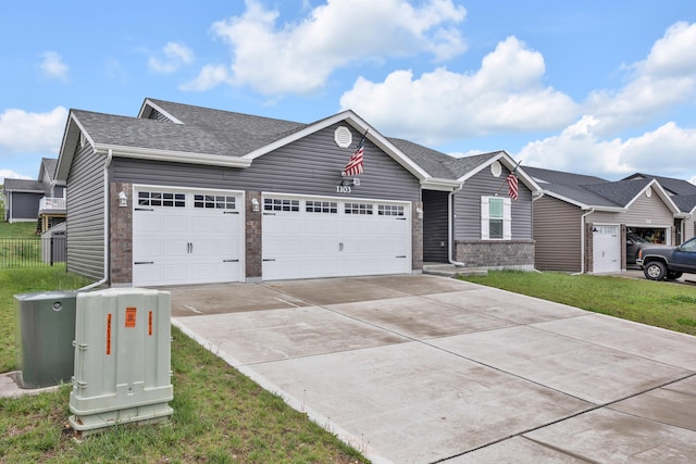1103 Baseball Dr, Foristell, MO 63384 - ranch-style home with driveway, a garage, fence, a front lawn, and a shingled roof