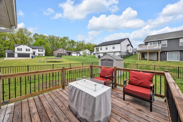 1103 Baseball Dr, Foristell, MO 63384 - deck featuring a residential view, an outbuilding, a fenced backyard, and a storage shed