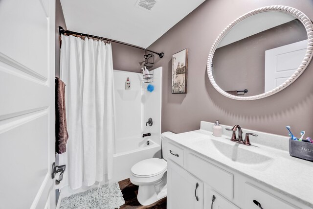 1103 Baseball Dr, Foristell, MO 63384 - full bath with vanity, toilet, shower / bathtub combination with curtain, wood finished floors, and visible vents