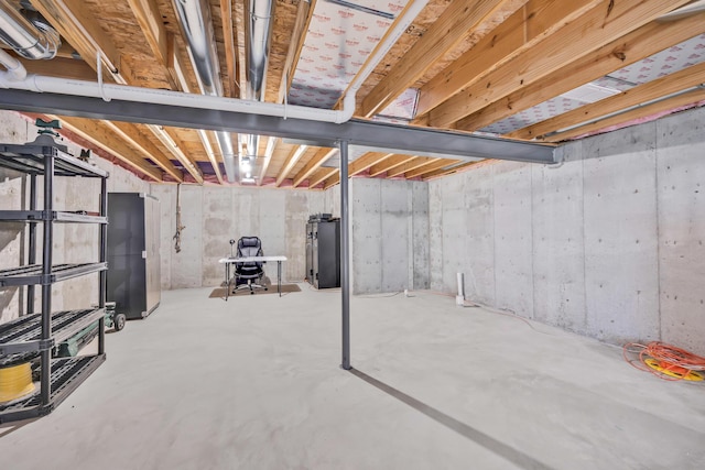 1103 Baseball Dr, Foristell, MO 63384 - unfinished below grade area featuring fridge