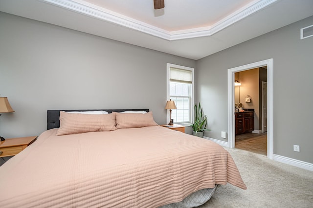 bedroom featuring connected bathroom, light colored carpet, ceiling fan, visible vents, and baseboards