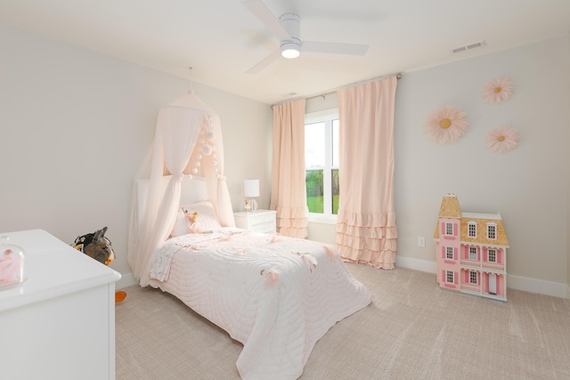 bedroom with visible vents, ceiling fan, light carpet, and baseboards