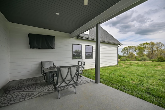 view of patio with outdoor dining area