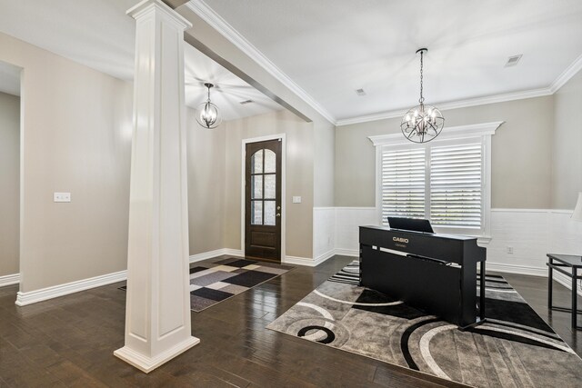 4210 Granite Springs Dr, Columbia, MO 65203 - entryway with a chandelier, a wainscoted wall, wood finished floors, decorative columns, and crown molding