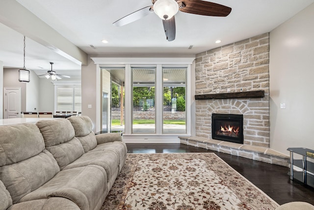 4210 Granite Springs Dr, Columbia, MO 65203 - living room featuring ceiling fan, a fireplace, dark wood-style flooring, and recessed lighting