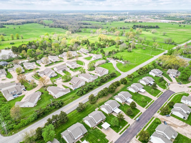 birds eye view of property with a residential view