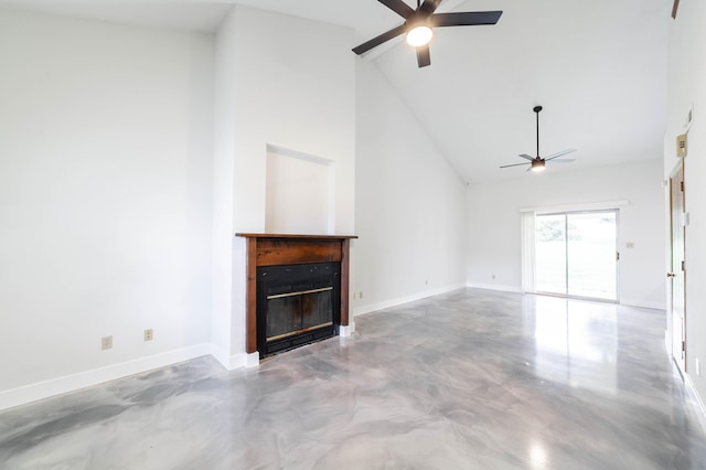 unfurnished living room featuring a glass covered fireplace, a ceiling fan, concrete flooring, and high vaulted ceiling