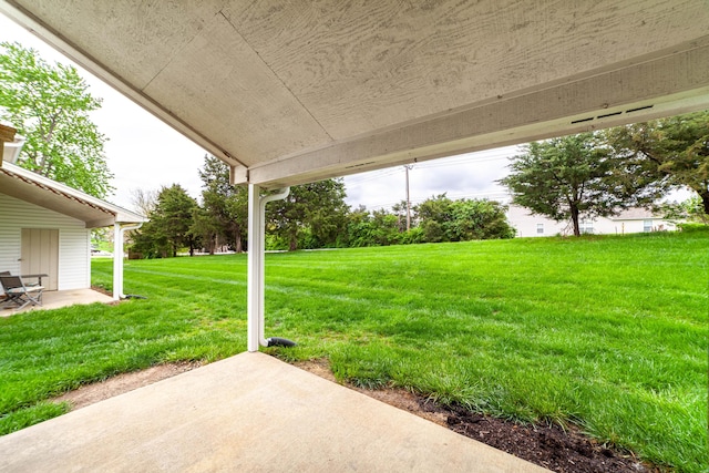 view of yard with a patio area