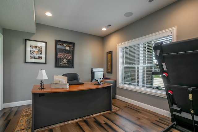office space featuring recessed lighting, visible vents, dark wood-style flooring, and baseboards