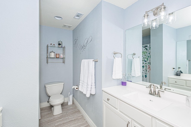 full bath featuring baseboards, toilet, wood finished floors, and visible vents