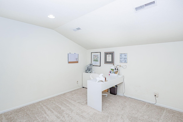 carpeted office with baseboards, lofted ceiling, and visible vents