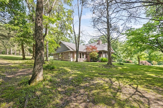7114 W River Oaks Rd, Columbia, MO 65203 - view of grassy yard