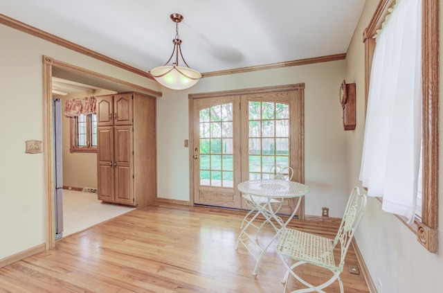 302 Park Rd, Fayette, MO 65248 - dining space with baseboards, a wealth of natural light, and light wood-type flooring