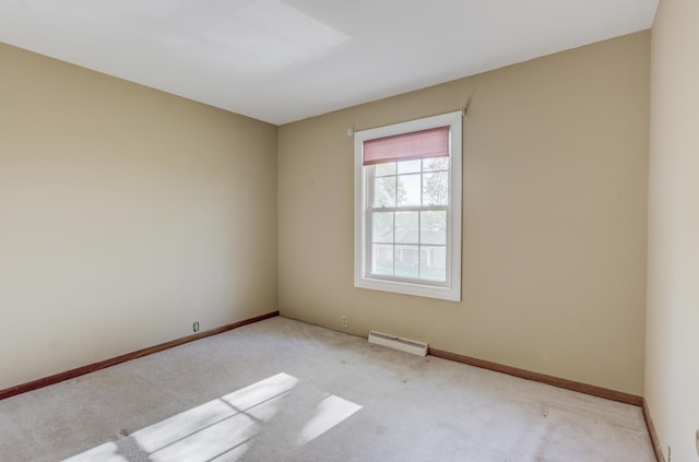 302 Park Rd, Fayette, MO 65248 - empty room featuring a baseboard radiator, carpet, and baseboards