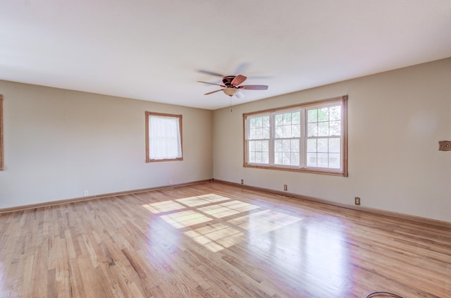 302 Park Rd, Fayette, MO 65248 - empty room with light wood-style floors, baseboards, and ceiling fan