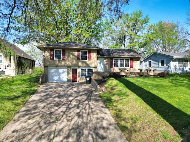 302 Park Rd, Fayette, MO 65248 - tri-level home with a garage, driveway, and a front lawn