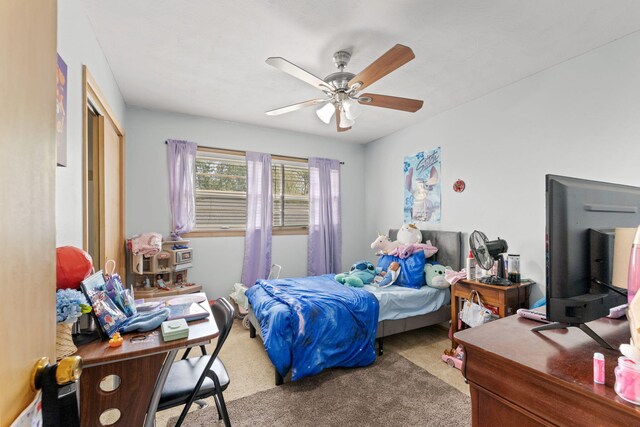 208 Bourn Ave, Columbia, MO 65203 - bedroom featuring carpet floors, a closet, and a ceiling fan