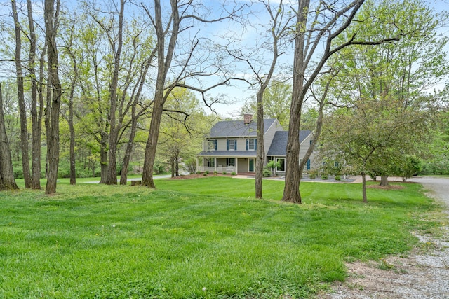 view of yard with covered porch