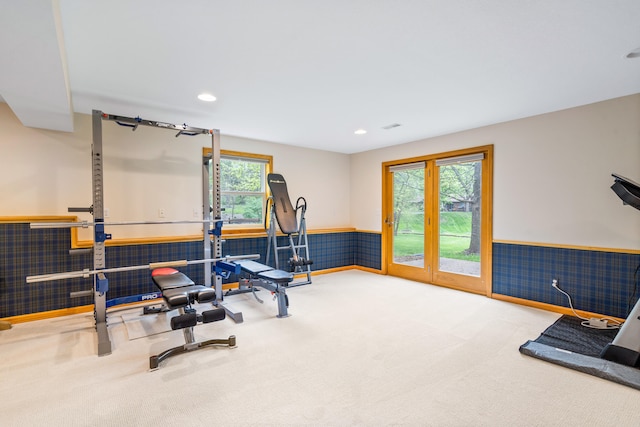 workout room with recessed lighting, carpet flooring, and wainscoting