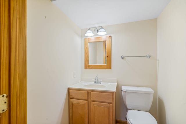 half bath with toilet and vanity