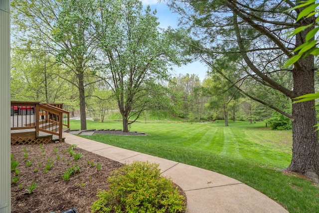 view of yard with a deck