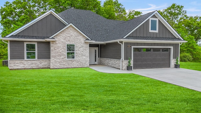 6176 Partridge Ct, Columbia, MO 65202 - craftsman house with stone siding, board and batten siding, driveway, and a front lawn
