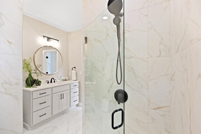 6176 Partridge Ct, Columbia, MO 65202 - bathroom with a marble finish shower, vanity, and marble tiled flooring