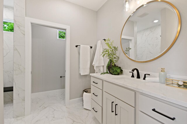 6176 Partridge Ct, Columbia, MO 65202 - bathroom with marble finish flooring, vanity, and a marble finish shower