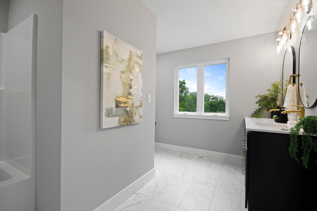 6176 Partridge Ct, Columbia, MO 65202 - bathroom with vanity and marble look tile flooring