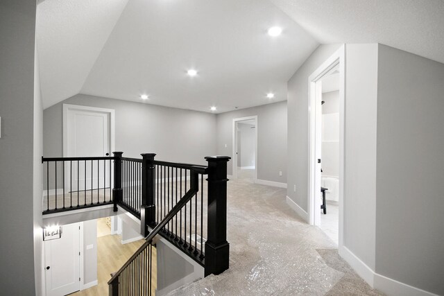 6176 Partridge Ct, Columbia, MO 65202 - hall featuring an upstairs landing, lofted ceiling, and recessed lighting