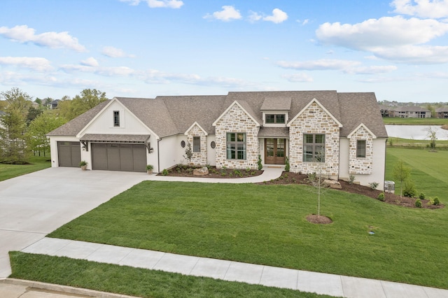 view of front of house featuring a shingled roof, a garage, stone siding, a front lawn, and concrete driveway