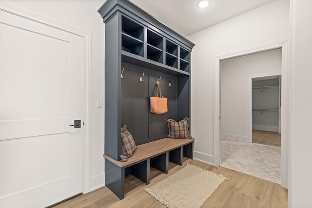 mudroom featuring wood finished floors, recessed lighting, and baseboards