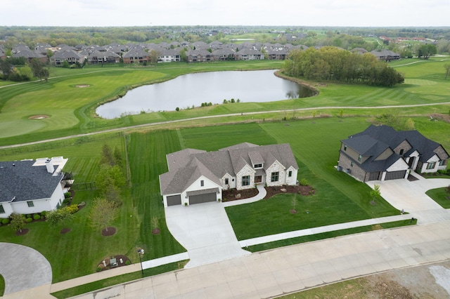 birds eye view of property with a water view and a residential view