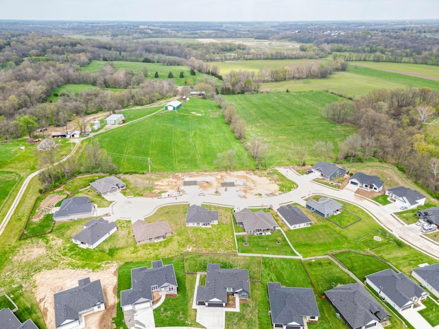 aerial view featuring a rural view and a residential view