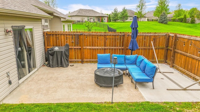 view of patio / terrace with fence, a residential view, an outdoor living space, and a grill