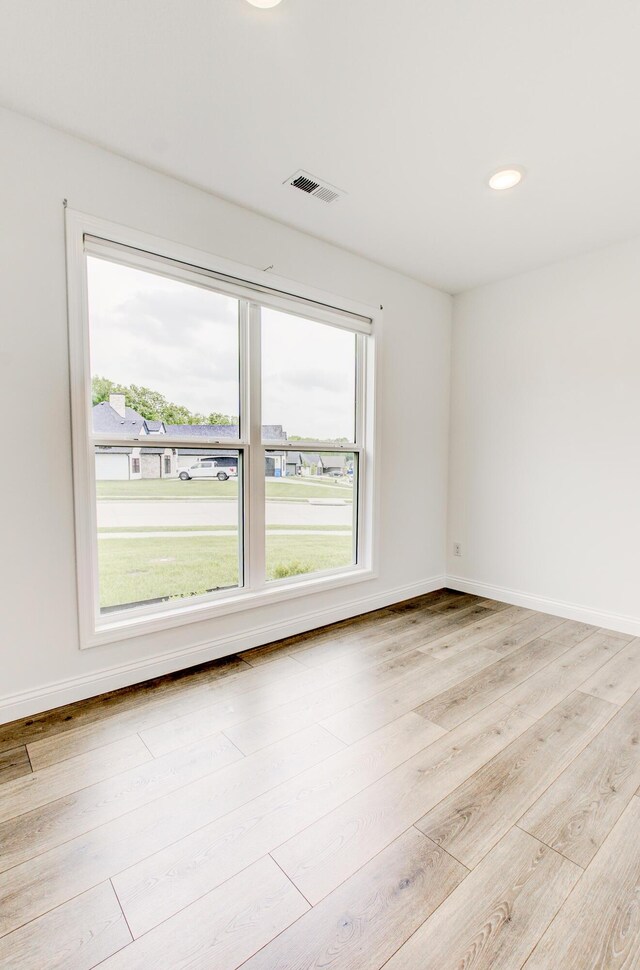 6575 Gateway Arch Way, Ashland, MO 65010 - empty room with light wood-style floors, baseboards, and recessed lighting