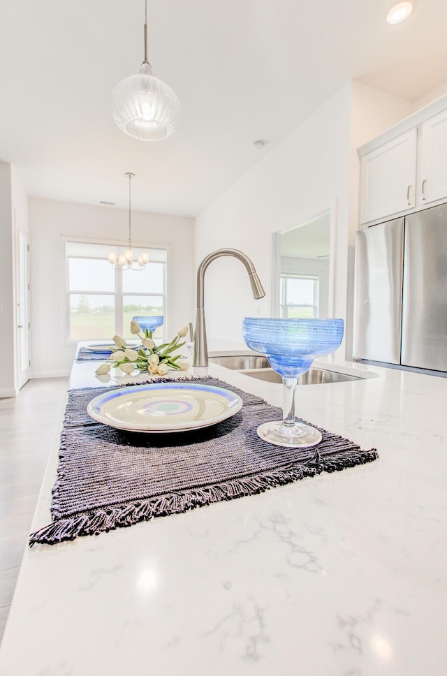 6575 Gateway Arch Way, Ashland, MO 65010 - dining room featuring a chandelier and recessed lighting