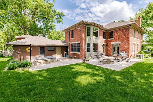 403 Westmount Ave, Columbia, MO 65203 - rear view of house with a fire pit, a patio, a yard, and a chimney