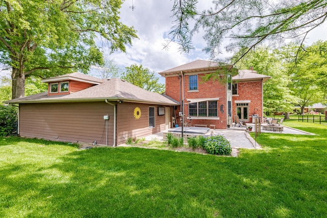 403 Westmount Ave, Columbia, MO 65203 - back of property featuring a patio area, a yard, a fire pit, and brick siding